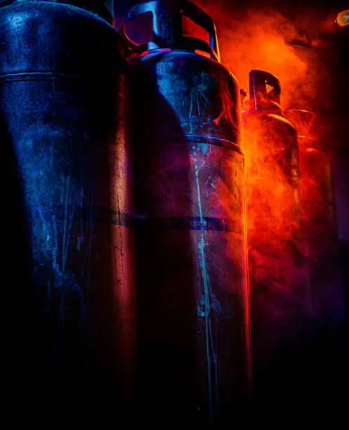 Photo of close up of gas bottles in smoke