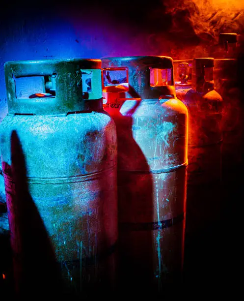 Photo of close up of gas bottles in smoke