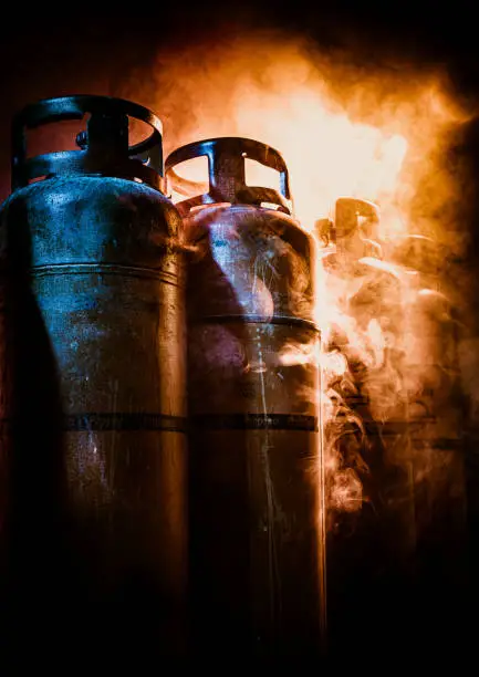 Photo of close up of gas bottles in smoke