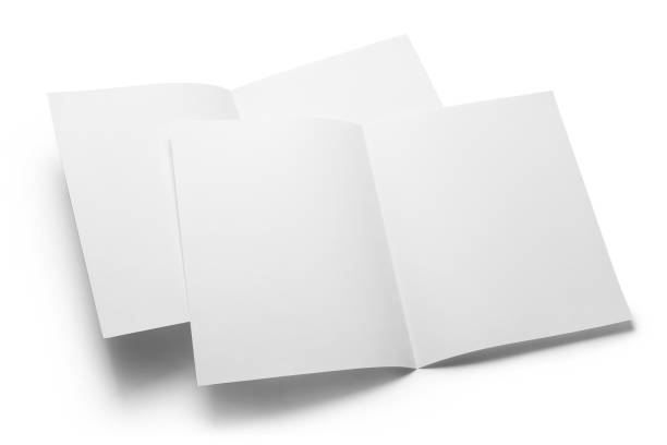 istock Folded sheets of paper on white 1182676610