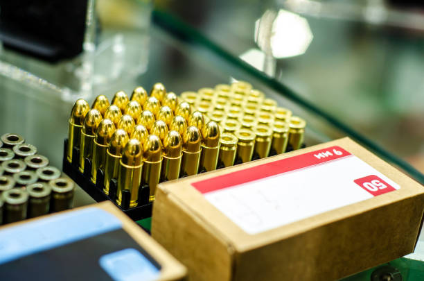 Close-up of box 9mm ammo Close-up of box 9mm ammo ammunition photos stock pictures, royalty-free photos & images
