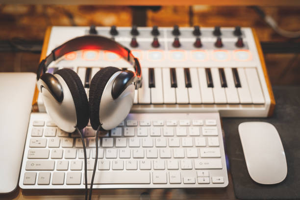 istock headphone on music keyboard. music concept 1182678113