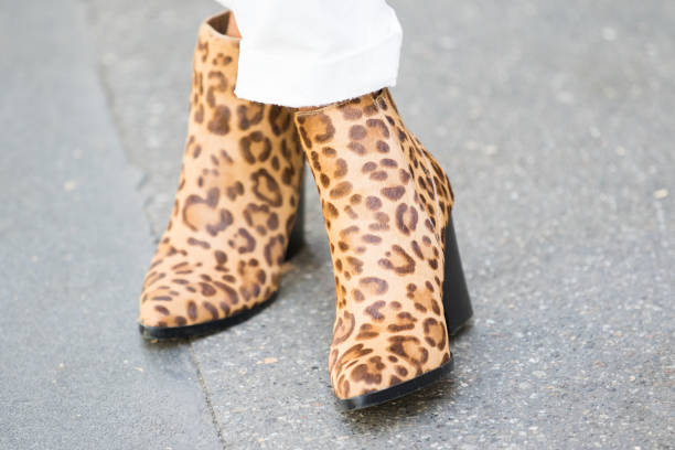 istock Model wears a pair of leopard-print boots 1182680301