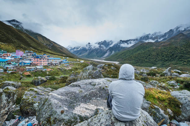 istock A person overlooking Kyanjin Kharka Village 1182680581