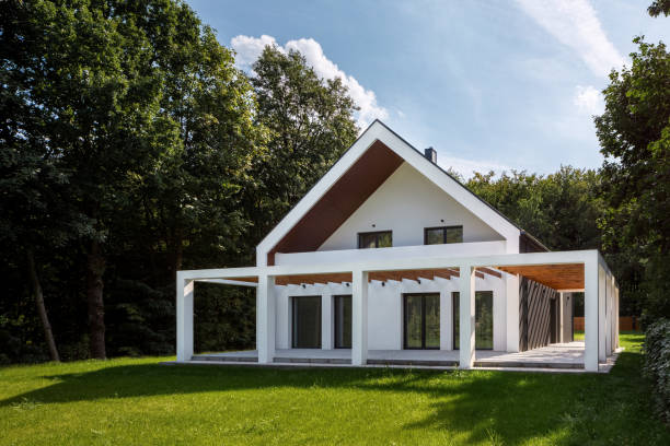 istock Amazing white house in forest 1182682371