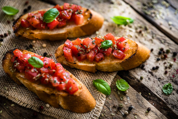 istock Homemade Italian bruschetta on rustic wooden table 1182682432