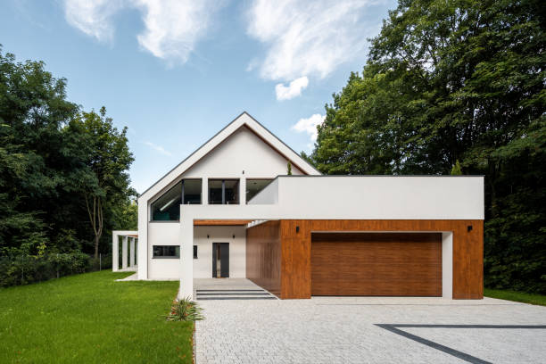 istock New house with cobblestone driveway 1182682435