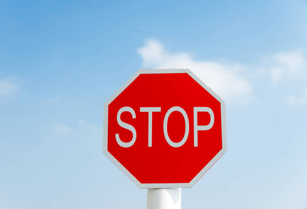 istock Stop traffic sign under blue sky 1182682516