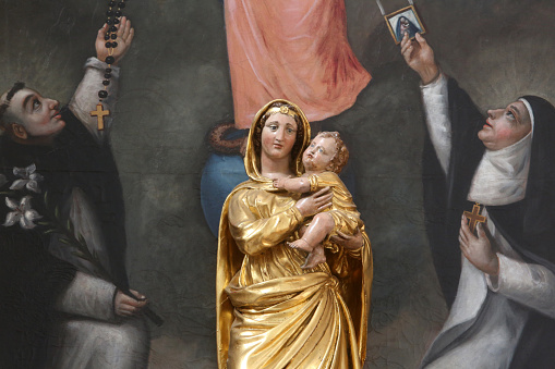 Madonna and Child. St. Dominic and St. Catherine of Siena. Church of Saint-Gervais and Saint-Protais. Saint-Gervais-les-Bains. Haute-Savoie. France.