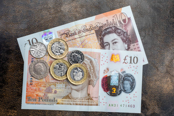 United Kingdom - Sterling pounds bank notes and coins United Kingdom - Sterling pounds bank notes and coins elizabeth ii photos stock pictures, royalty-free photos & images