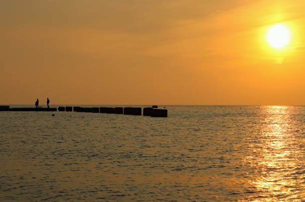 istock sunset at sea beautiful landscape 1182686802