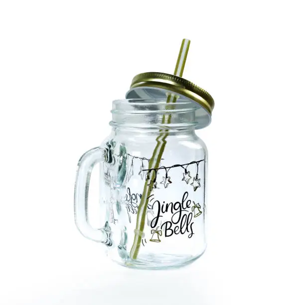 Photo of Empty glass jar mug. Close up. Isolated on white background