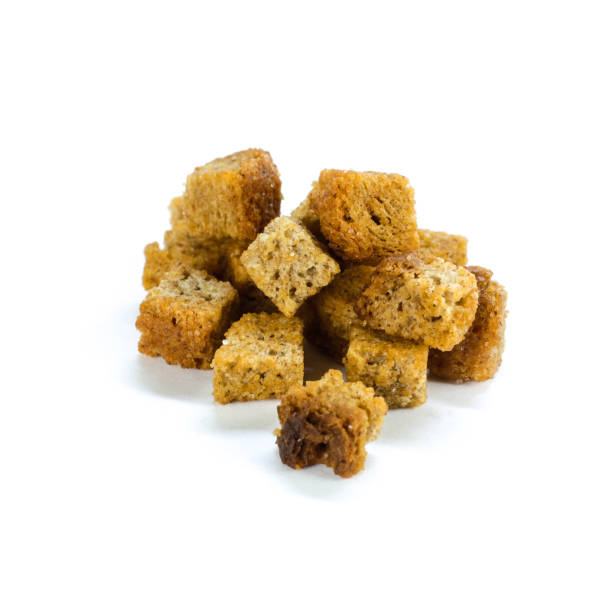 istock Brown salted crackers. Close up. Isolated on white background 1182687521
