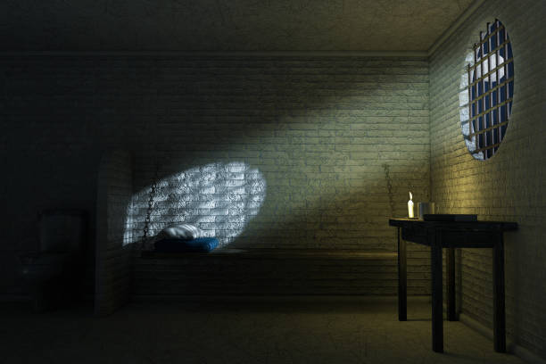 istock Darl Old Prison Cell Interior for One Person with Bed, Table, Toilet. 3d Rendering 1182690024