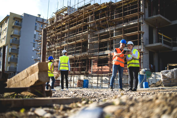 istock Group of construction workers on building site.Stock photo 1182691742