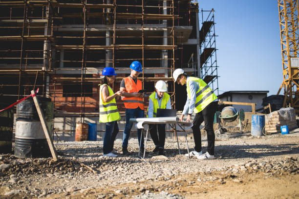 istock Group of construction workers on building site.Stock photo 1182691798