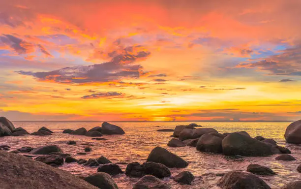 Photo of stunning sunset above the rocks