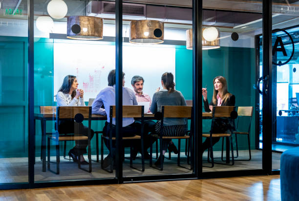 istock Manager leading the meeting in the office 1182693753