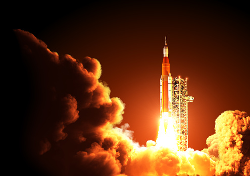 Space Launch System Takes Off At Night. 3D Illustration.