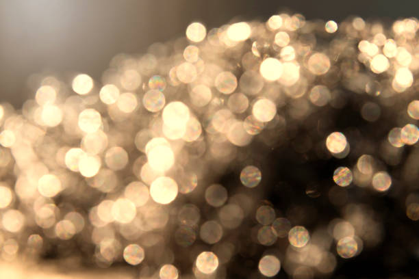 istock Golden Abstract bokeh light effect on background 1182695393
