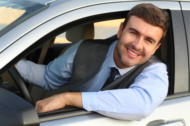 istock Elegant male driver with a gorgeous smile 1182697016