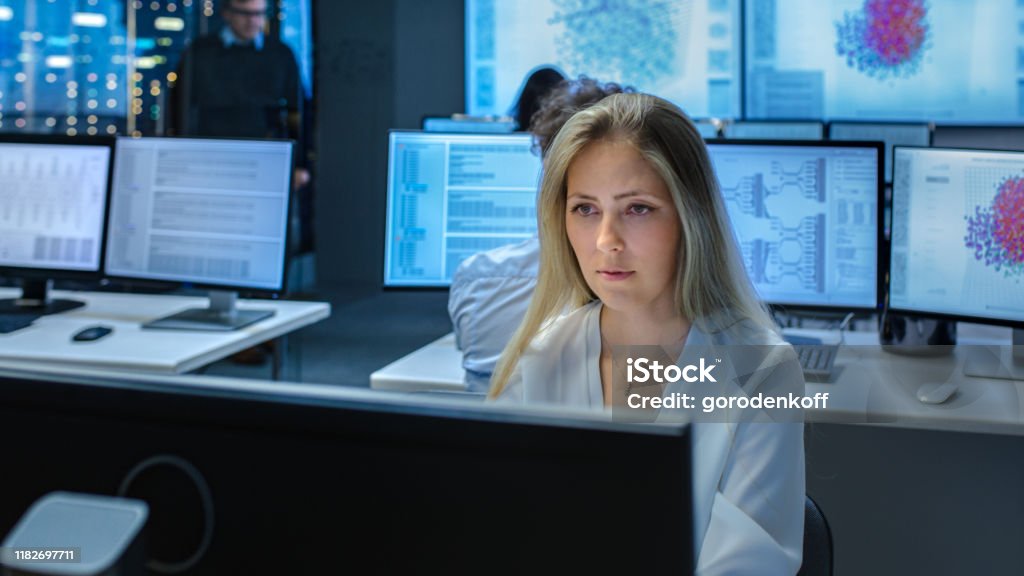 Female Computer Engineer Works On A Neural Network Artificial ...