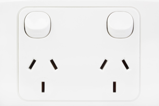 Single grey electric socket with cable and plug isolated on white background without shadow. Top view of Electric plug socket with 4 plug rooms