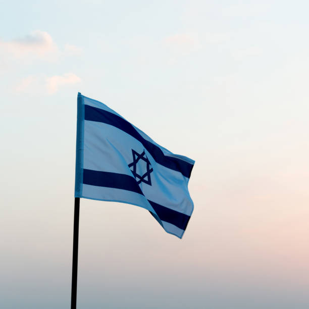 istock Israel's national flag in the wind 1182699883