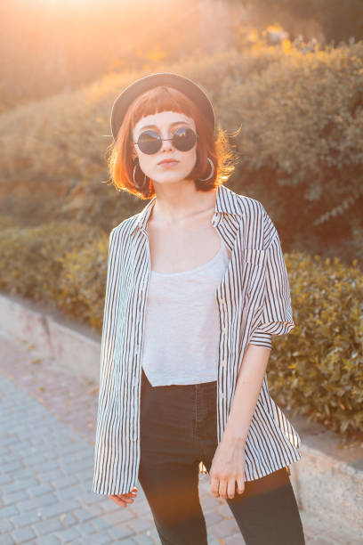istock Woman walking in the park 1182702136
