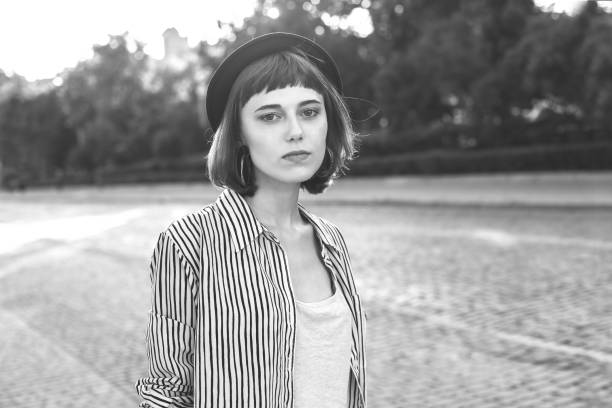 istock Young woman walking down the street 1182702178