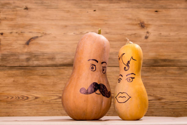istock Happy pumpkin family funny faces 1182705319