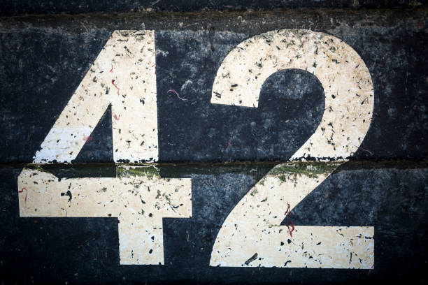 istock Number forty two in bold figures on black background 1182706490