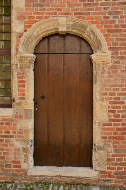 istock Door at brick house 1182709170