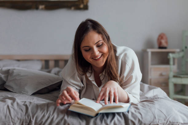 istock Woman Reading a Book 1182710467