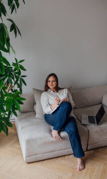 istock Young Woman Working at Home 1182710530