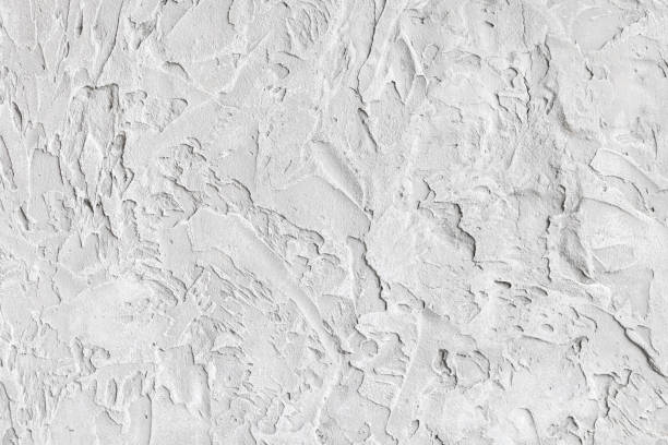 istock White wall with coarse and coarse texture. Background image 1182711147