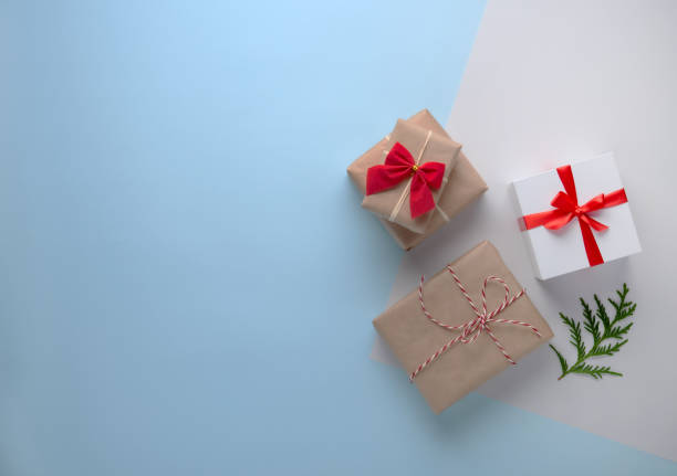 istock Christmas flat lay with box presents on blue background. Top view 1182712410