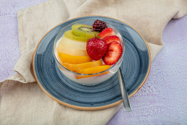 istock Strawberry Custard, Pudding with strawberry over wooden background. 1182715858