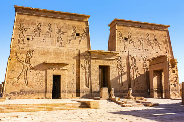 Temple of Philae aka Temple of Isis in Aswan Egypt Entrance of the Temple of Philae aka Temple of Isis in Aswan Egypt on a sunny day. temple of philae stock pictures, royalty-free photos & images