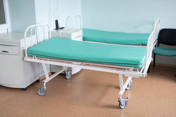istock An empty bed in a hospital without a patient. 1182717978