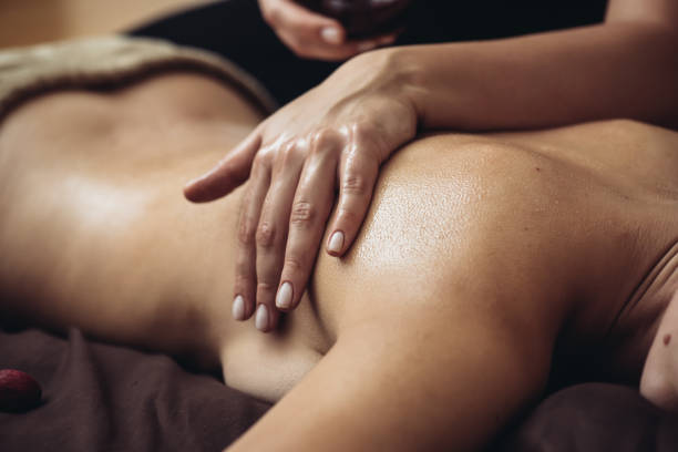 istock Aromatherapy massage is massage therapy using massage oil or lotion that contains essential oils 1182718011