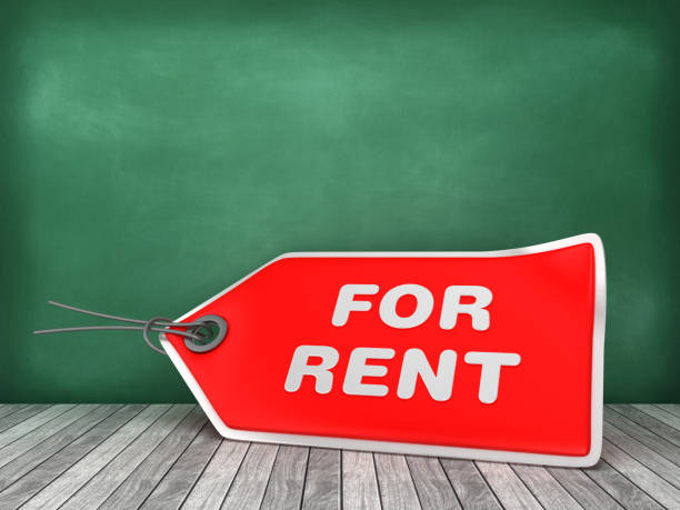 istock FOR RENT Price Tag on Chalkboard Background - 3D Rendering 1182718347