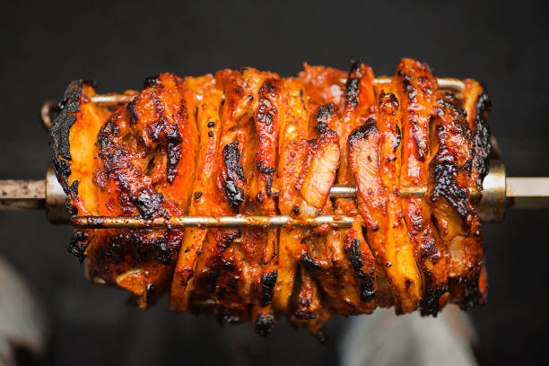 rotisserie meat stock photo