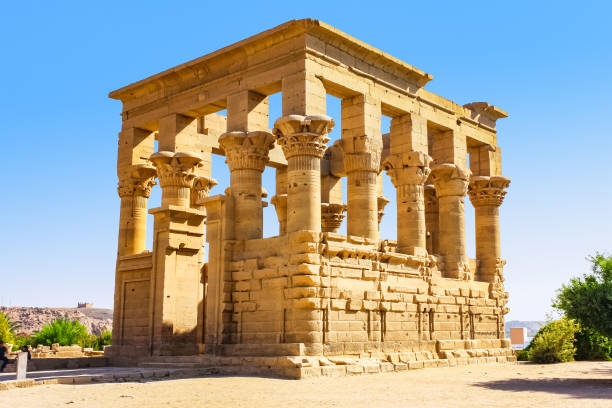 Trajan's Kiosk of Philae in Aswan Egypt Trajan's Kiosk of Philae is a hypaethral temple located on Agilkia Island in Aswan Egypt. temple of philae stock pictures, royalty-free photos & images