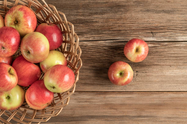 istock organic ripe apples on a wooden table 1182725337