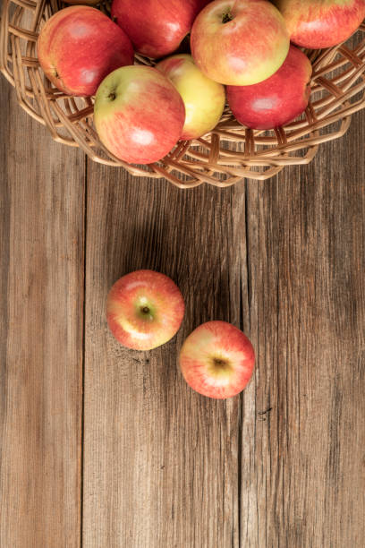 istock organic ripe apples on a wooden table 1182725352