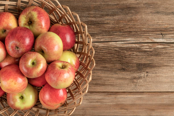 istock organic ripe apples on a wooden table 1182725369