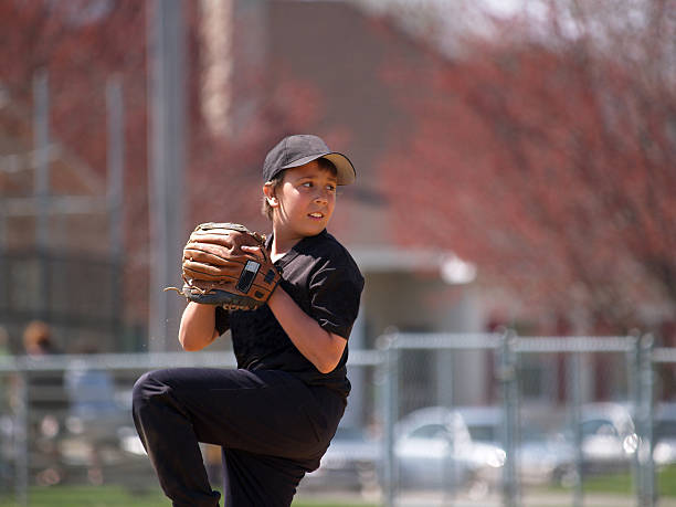 little league baseball pitcher stock photo