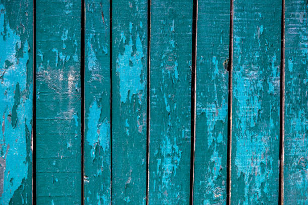 istock Wooden weathered plank board close up overhead blue textured background 1182728175