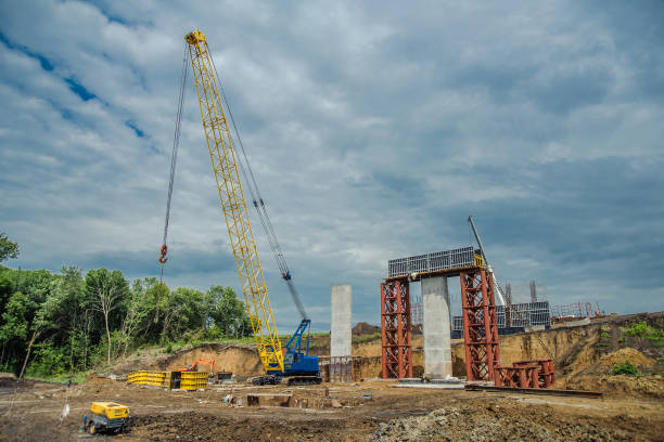 istock Crane on the construction of a bridge 1182729123